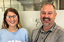 Dentist and female patient sharing healthy smiles