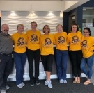 Dental team in matching shirts