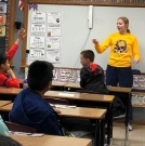 Dental team member talking to a class