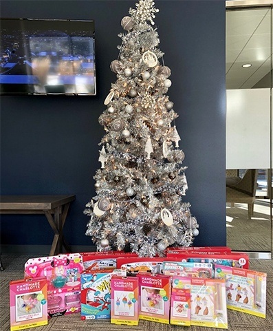 Christmas tree with gifts below it