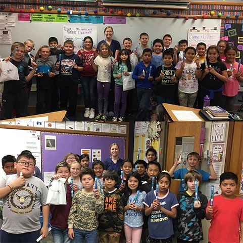 Two classrooms filled with smiling kids