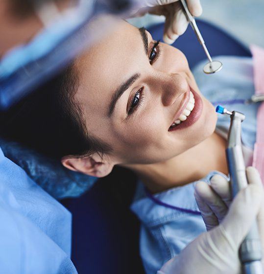 Woman receiving dental checkup