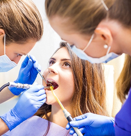 Patient at dentist in Denison for root canal therapy