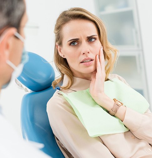 a patient visiting her dentist in Denison for root canal therapy