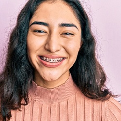 Girl smiling with braces in Denison