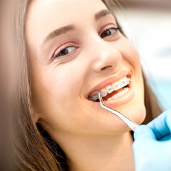 Girl receiving orthodontic checkup in Denison